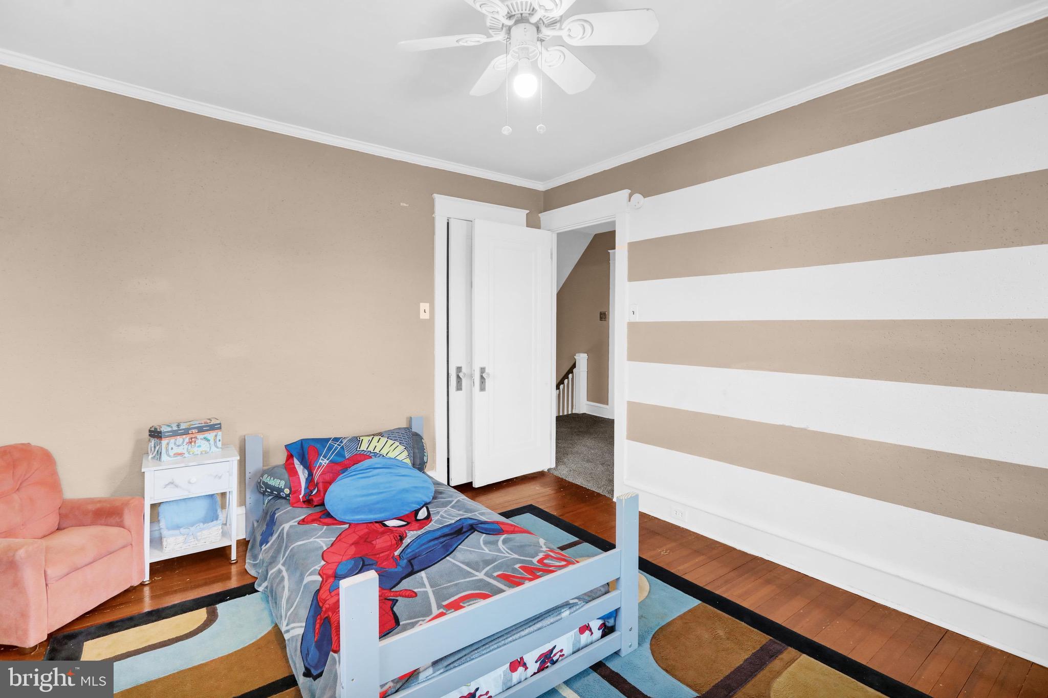 1511 Union Street Reading, PA 19604 - Photo 22 of 37 a bedroom with a bed and a window