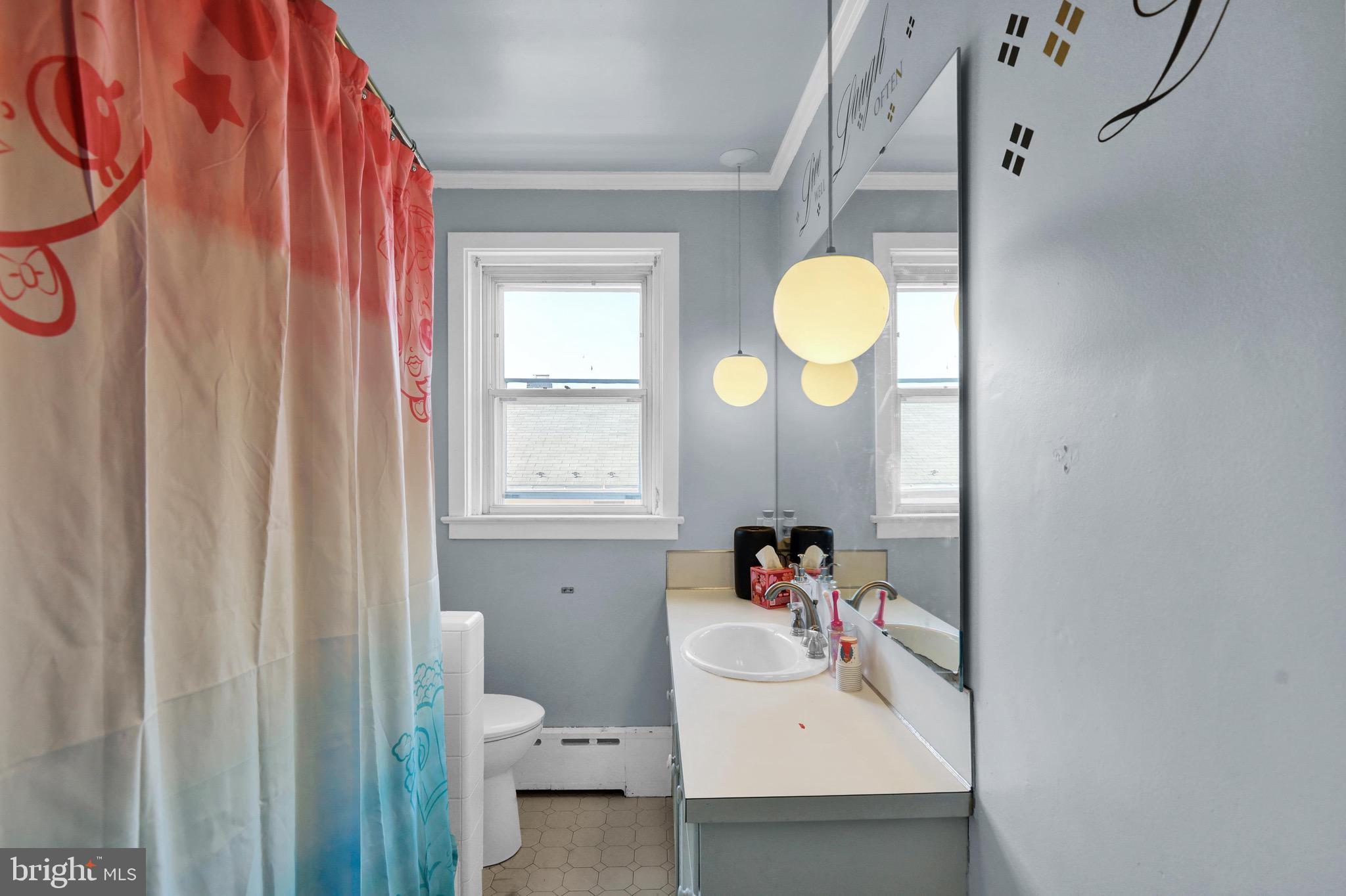 1511 Union Street Reading, PA 19604 - Photo 23 of 37 a bathroom with a sink and a mirror