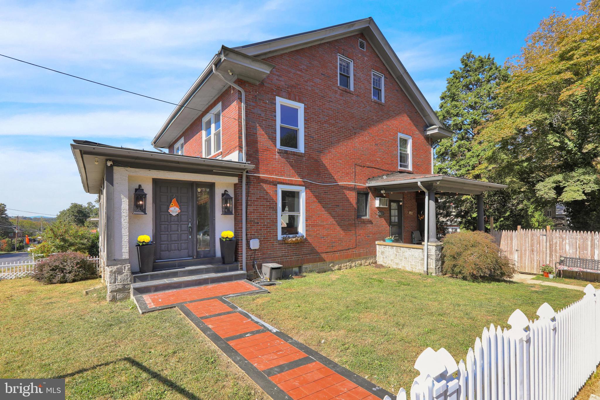 1511 Union Street Reading, PA 19604 - Photo 3 of 37 a front view of a house with a yard