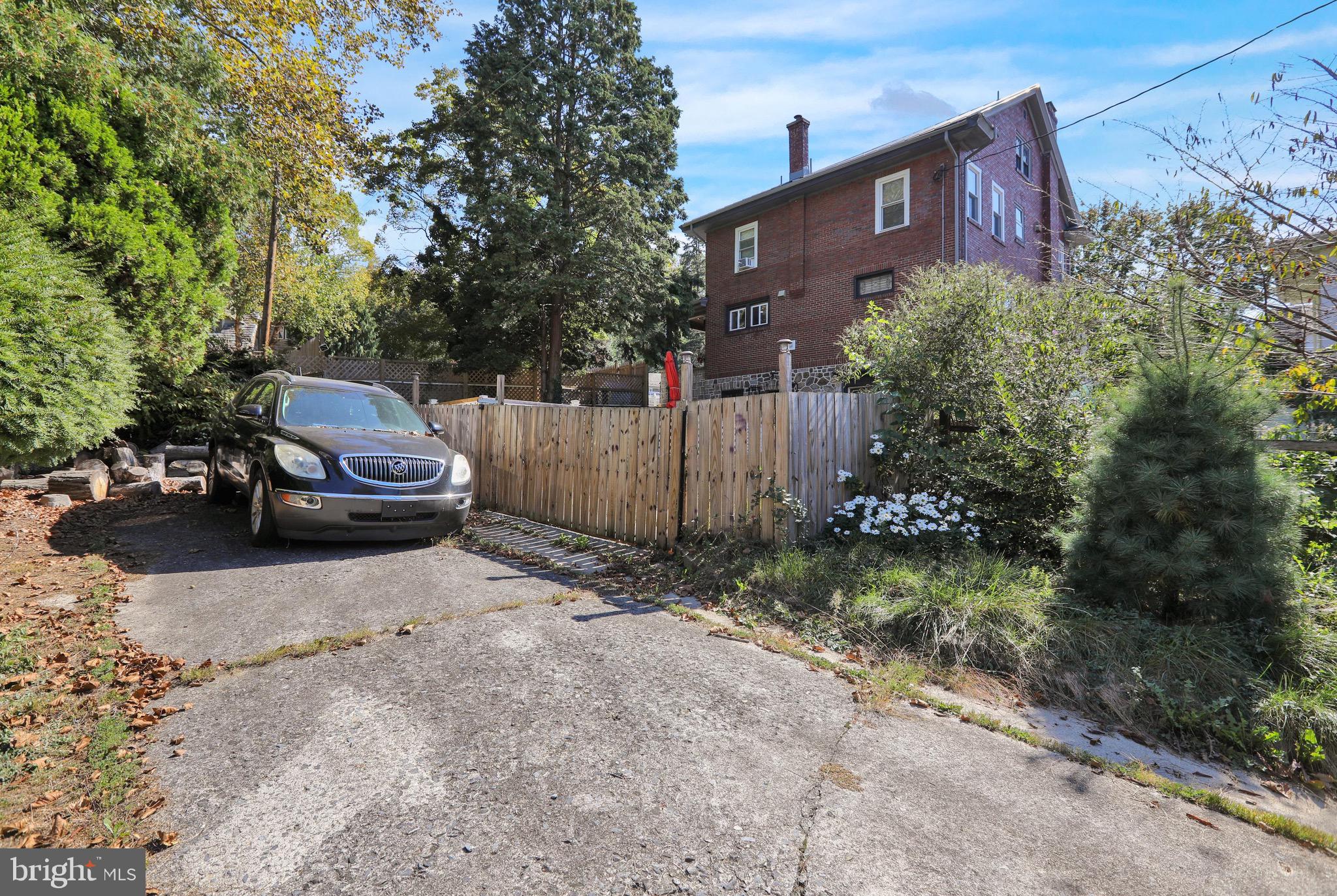 1511 Union Street Reading, PA 19604 - Photo 37 of 37 a car parked in front of a brick house