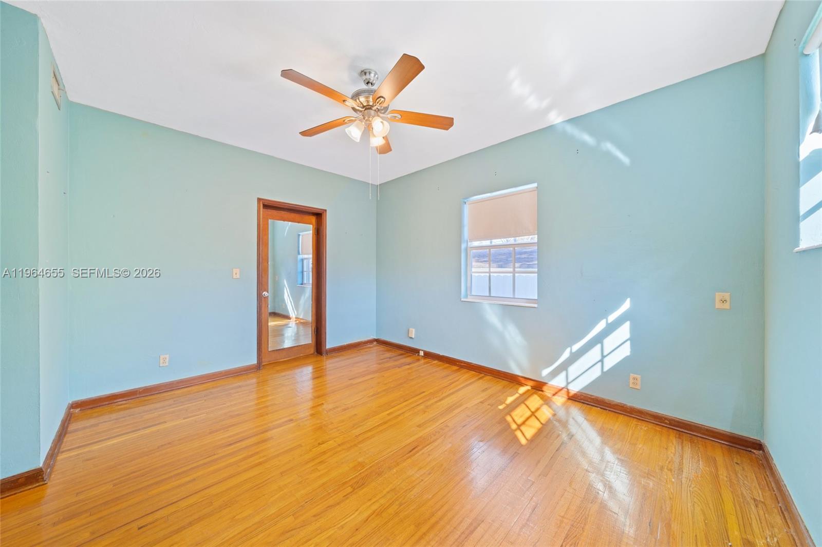 7110 Southwest 13th Terrace Miami, FL 33144 - Photo 16 of 39 a view of a big room with wooden floor and cabinet