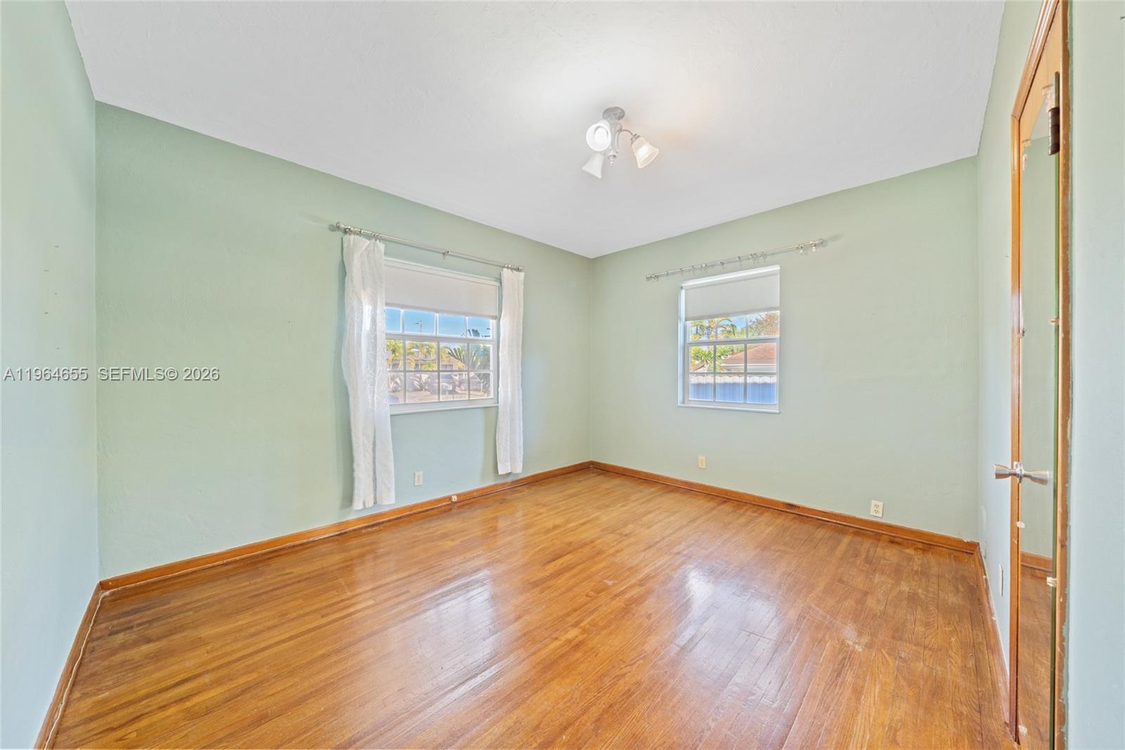 7110 Southwest 13th Terrace Miami, FL 33144 - Photo 23 of 39 a view of an empty room with a window