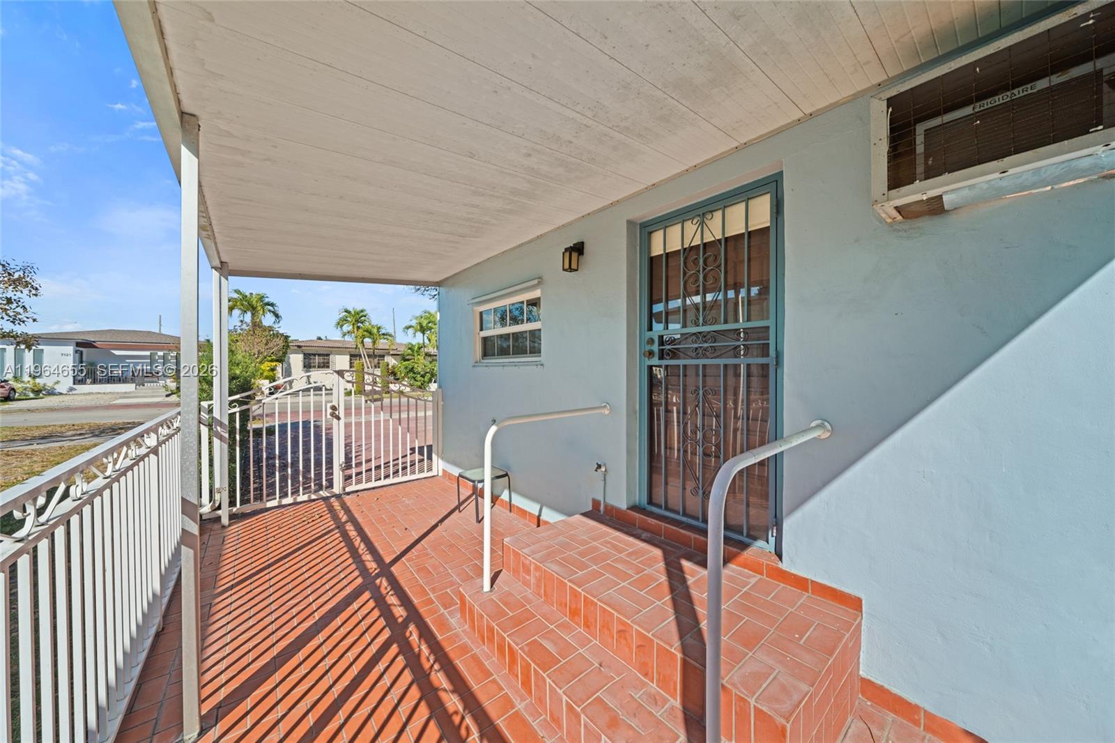 7110 Southwest 13th Terrace Miami, FL 33144 - Photo 25 of 39 a outdoor space with wooden floor and furniture