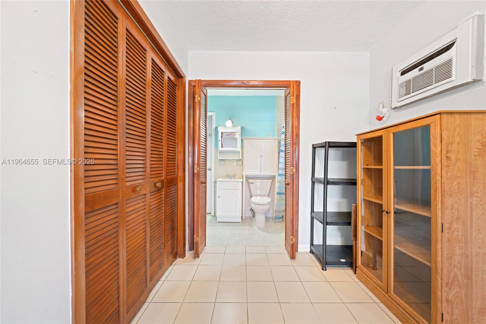 7110 Southwest 13th Terrace Miami, FL 33144 - Photo 28 of 39 a view of hallway with walk in closet