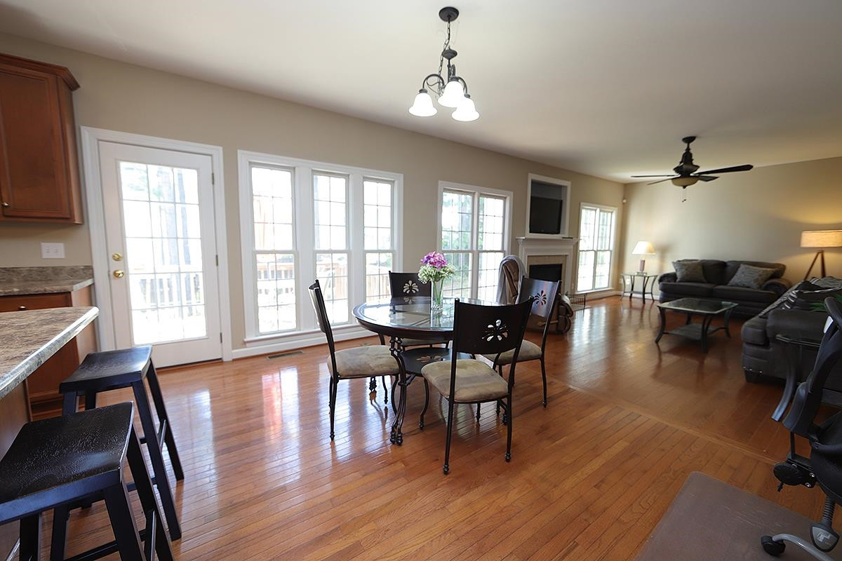 6017 Jones Farm Road Wake Forest, NC 27587 - Photo 8 of 25 There's table space here in this bright and airy sun-filled Breakfast Nook. (Note: Hardwoods throughout the entire 1st floor) Breakfast Nook