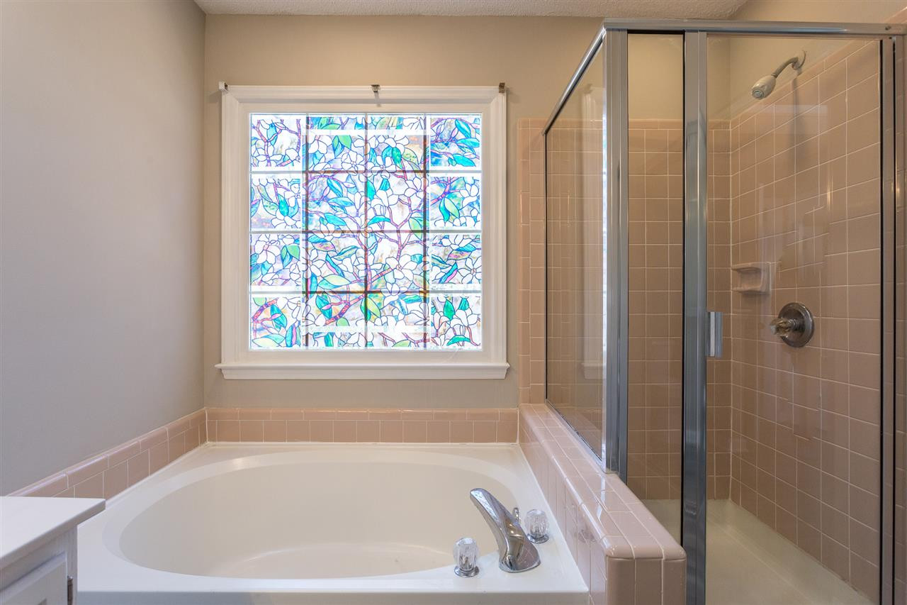 12000 North Exeter Way Raleigh, NC 27613 - Photo 23 of 29 Soaking Tub and Separate Shower
