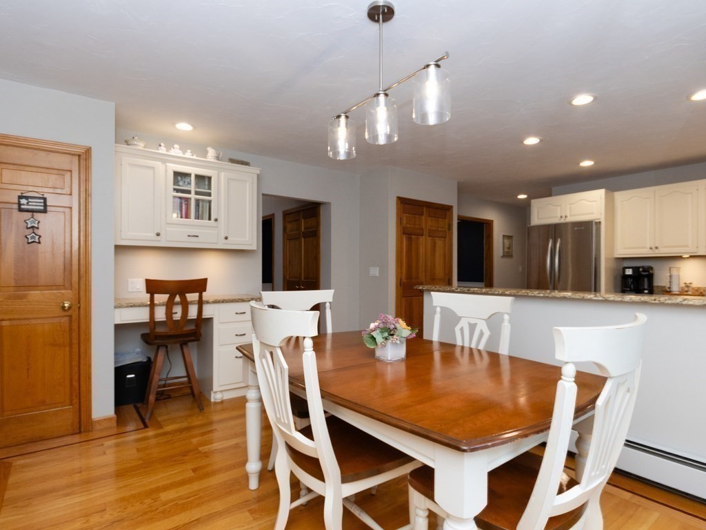 72 Emerson Road Walpole, MA 02032 - Photo 14 of 41 a view of a dining room with furniture