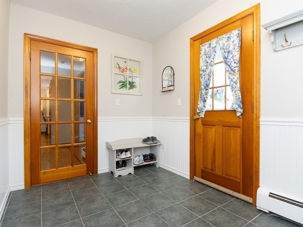 72 Emerson Road Walpole, MA 02032 - Photo 18 of 41 a view of front door with wooden floor