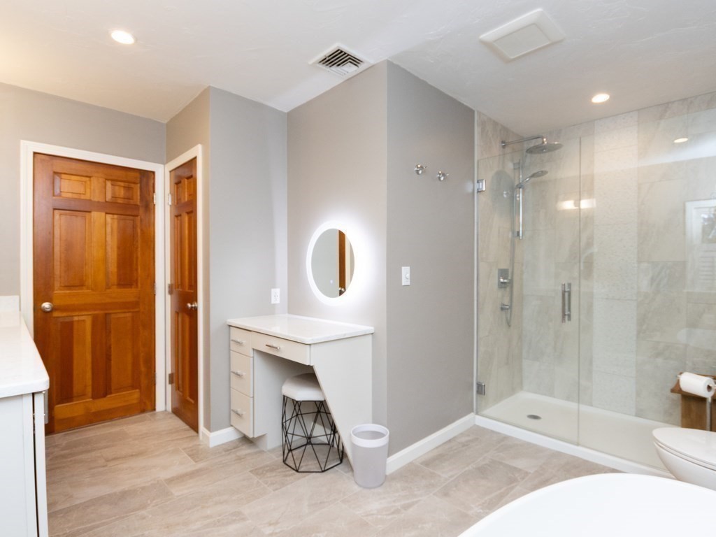 72 Emerson Road Walpole, MA 02032 - Photo 27 of 41 a bathroom with a sink a toilet and shower