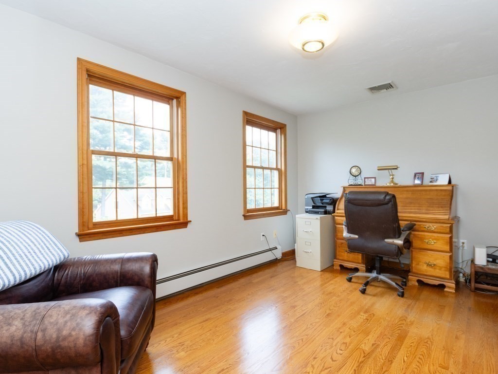72 Emerson Road Walpole, MA 02032 - Photo 28 of 41 a view of a livingroom with workspace and a window