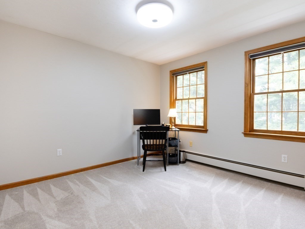 72 Emerson Road Walpole, MA 02032 - Photo 32 of 41 a living room with furniture and a window