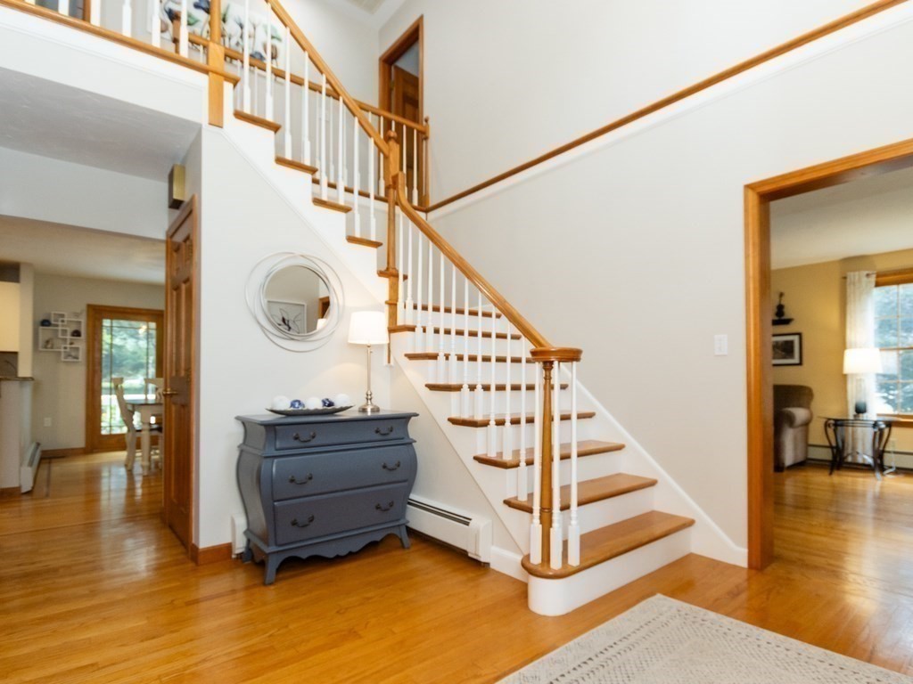 72 Emerson Road Walpole, MA 02032 - Photo 5 of 41 a view of entryway and hall with wooden floor