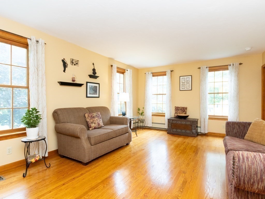 72 Emerson Road Walpole, MA 02032 - Photo 6 of 41 a living room with furniture and a window