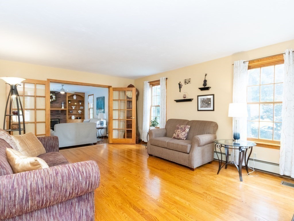 72 Emerson Road Walpole, MA 02032 - Photo 7 of 41 a living room with furniture and a window