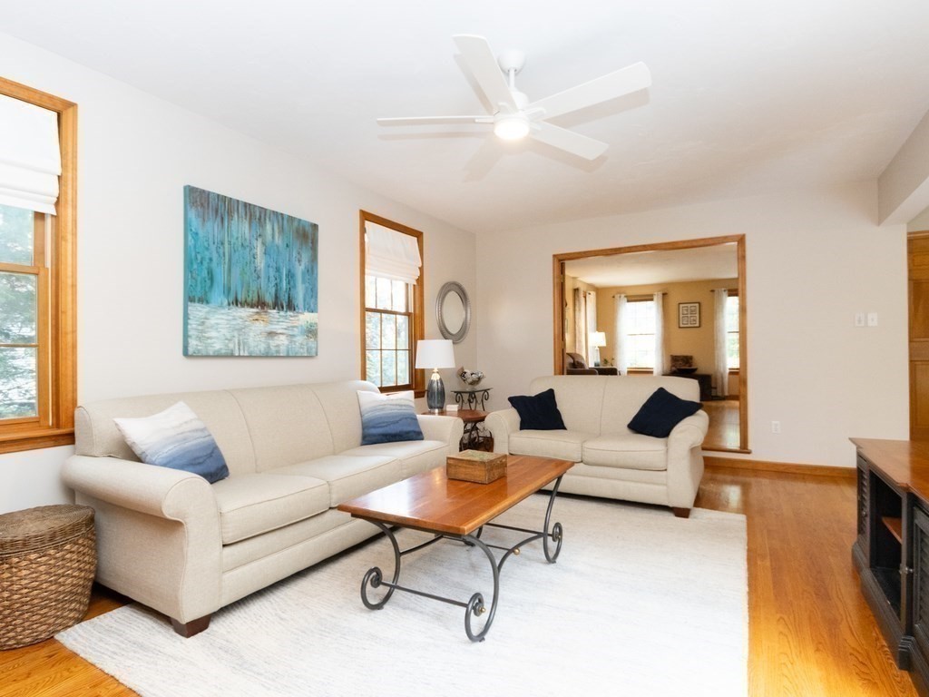 72 Emerson Road Walpole, MA 02032 - Photo 10 of 41 a living room with fireplace furniture and a window