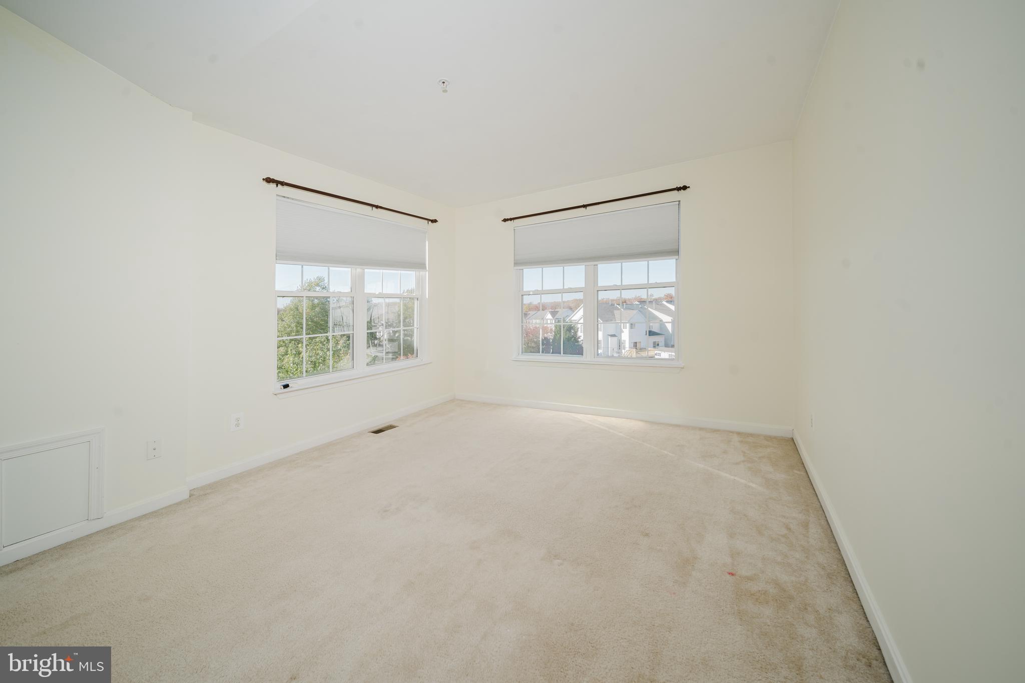 714 Kirkcaldy Way Abingdon, MD 21009 - Photo 15 of 34 an empty room with windows
