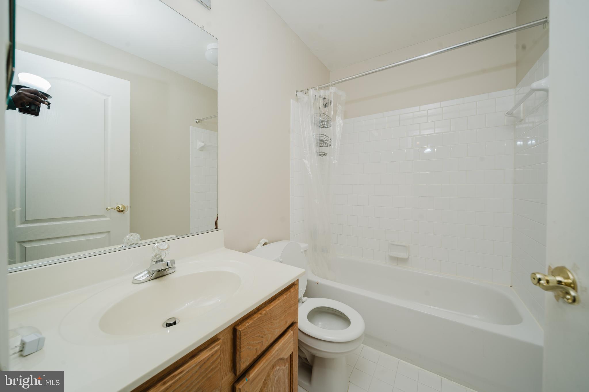 714 Kirkcaldy Way Abingdon, MD 21009 - Photo 18 of 34 a bathroom with a sink a toilet and shower