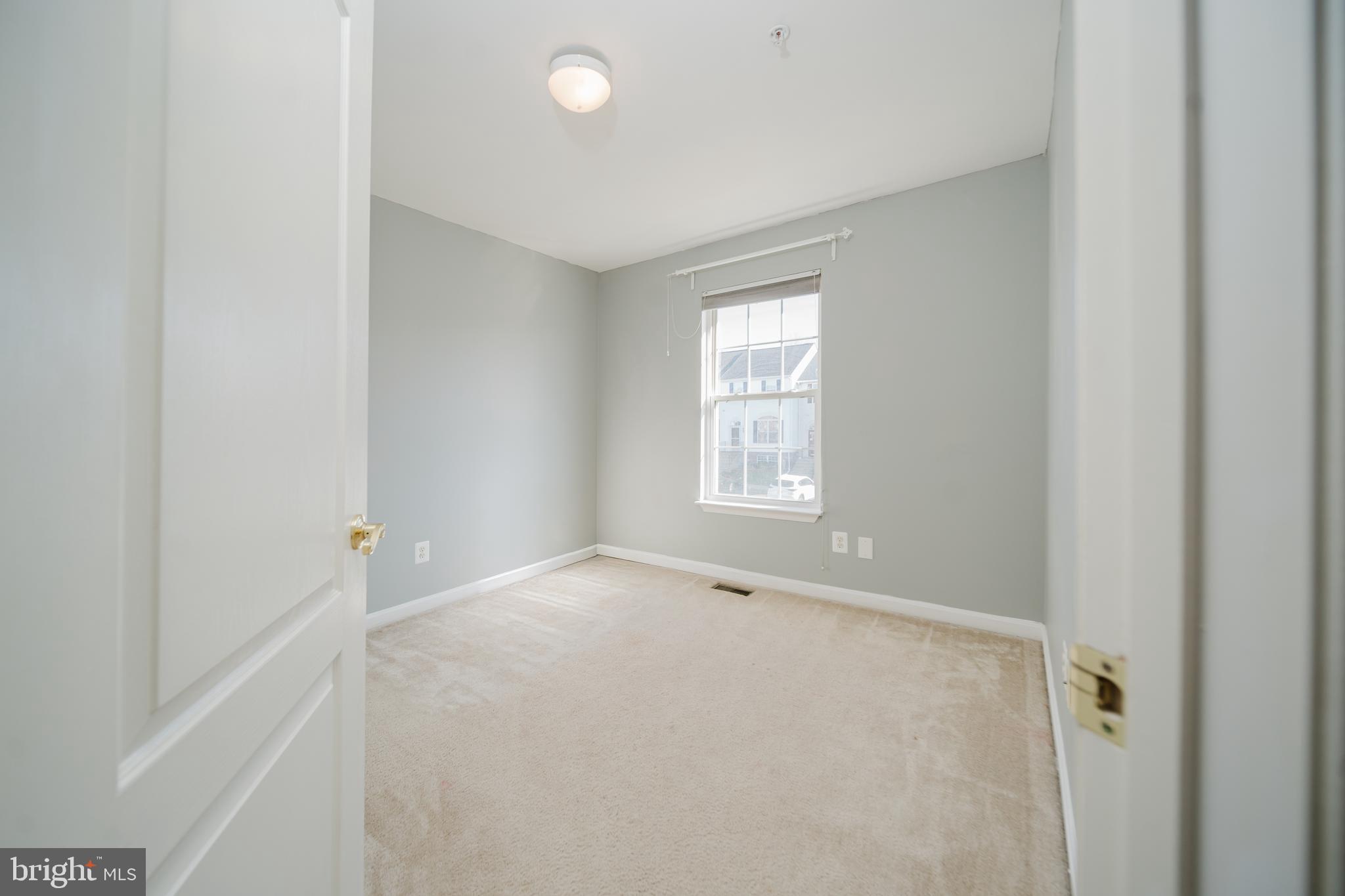 714 Kirkcaldy Way Abingdon, MD 21009 - Photo 21 of 34 an empty room with windows