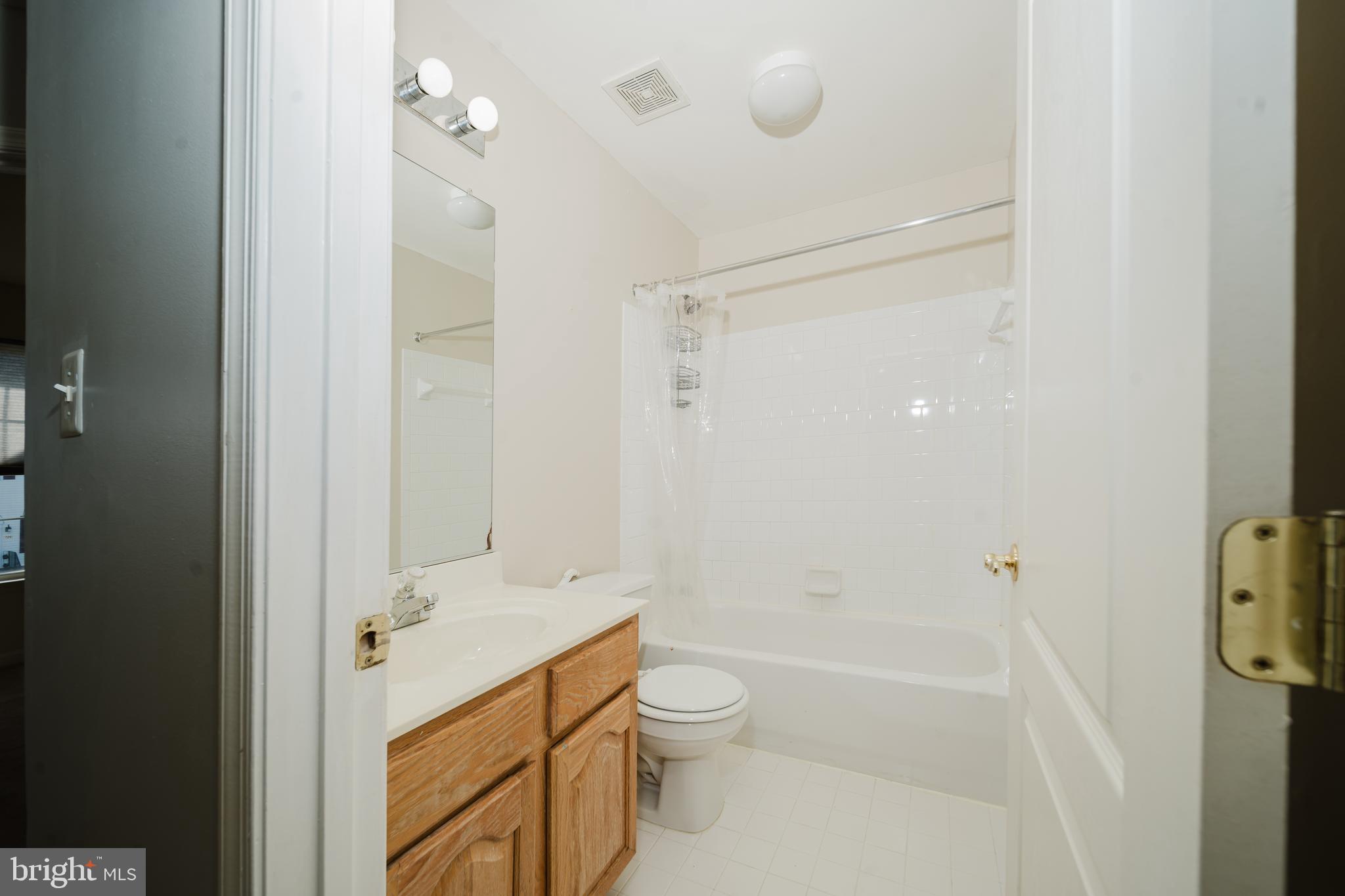 714 Kirkcaldy Way Abingdon, MD 21009 - Photo 23 of 34 a bathroom with a granite countertop sink toilet and shower