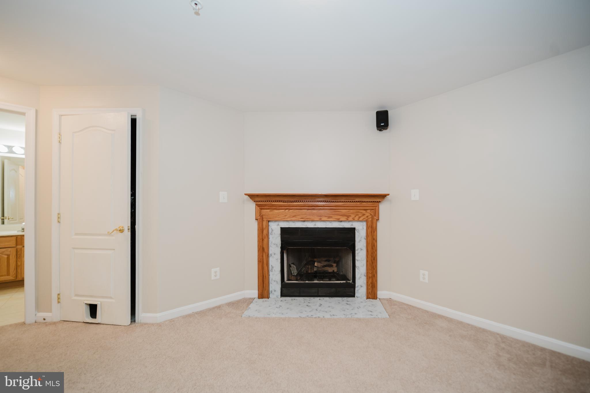 714 Kirkcaldy Way Abingdon, MD 21009 - Photo 28 of 34 an empty room with fireplace