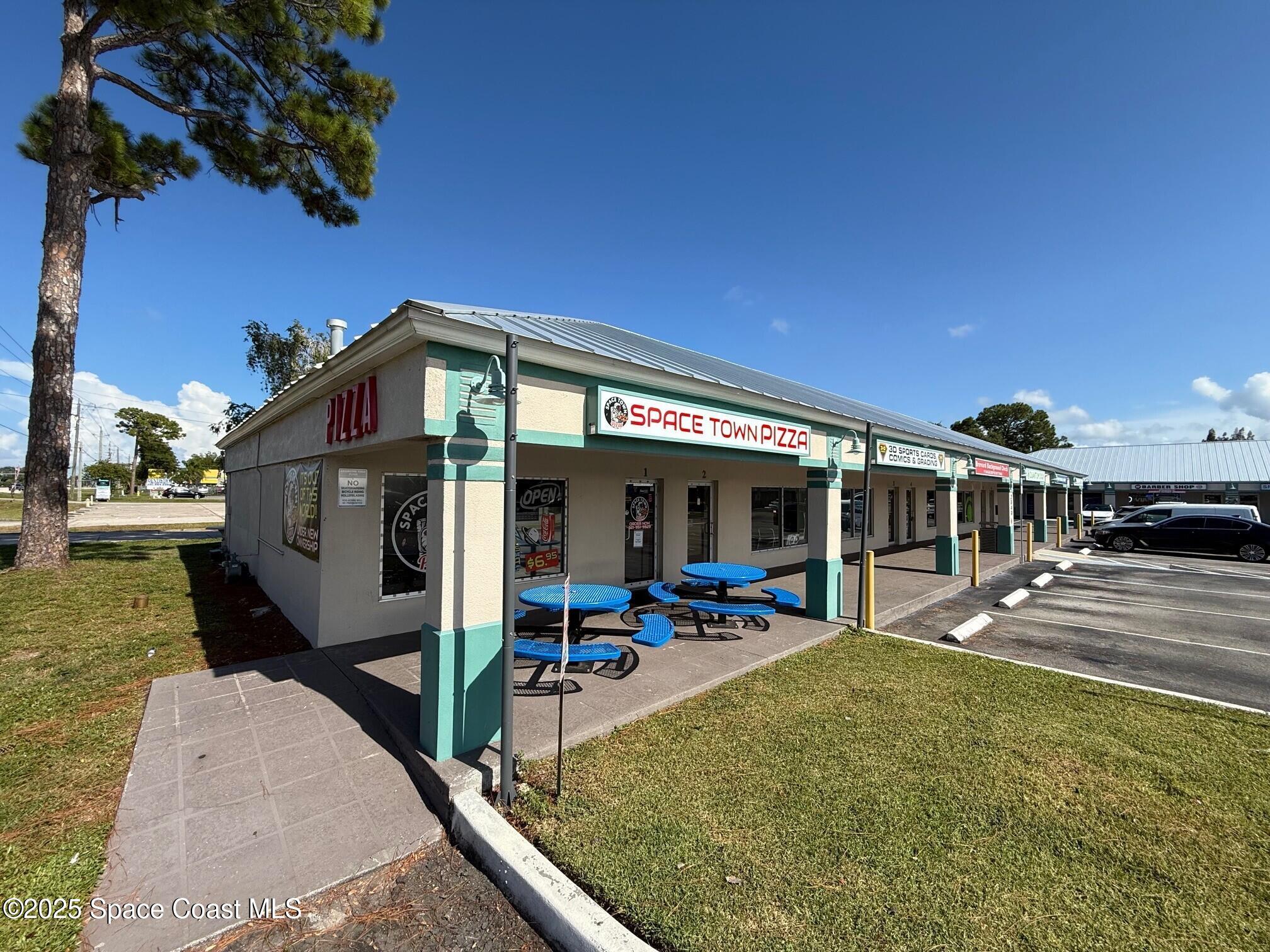 2040 Palm Bay Road Northeast, Unit 1 Palm Bay, FL 32905 - Photo 1 of 7 Exterior 5
