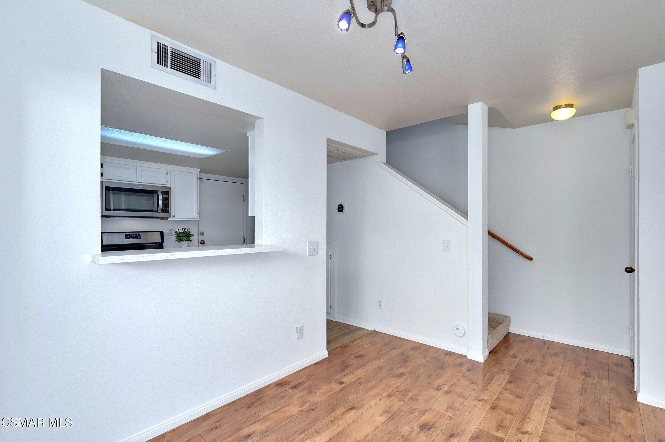 4508 Apricot Road, Unit B Simi Valley, CA 93063 - Photo 11 of 44 a view of kitchen with sink and wooden floor