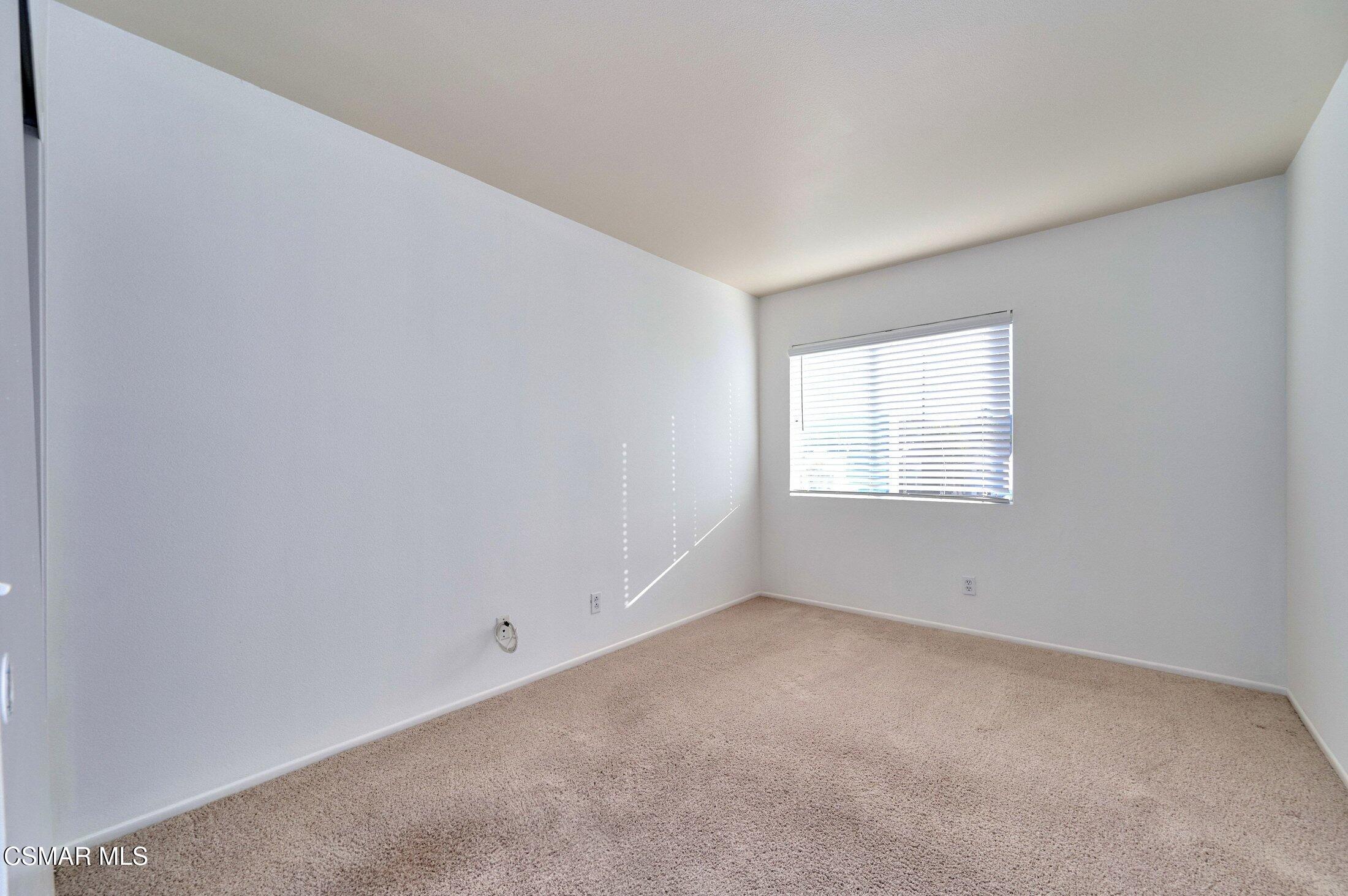 4508 Apricot Road, Unit B Simi Valley, CA 93063 - Photo 25 of 44 a view of an empty room with a window