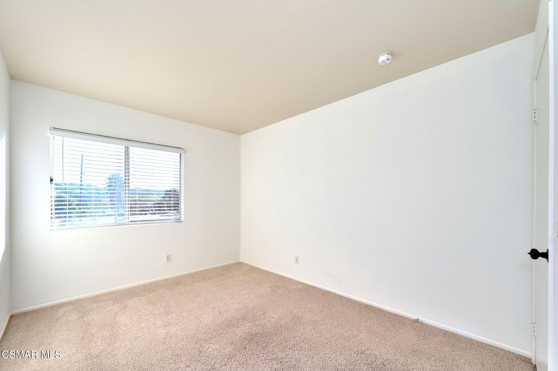 4508 Apricot Road, Unit B Simi Valley, CA 93063 - Photo 27 of 44 a view of an empty room with a window