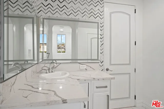 a view of a garden with an outdoor space