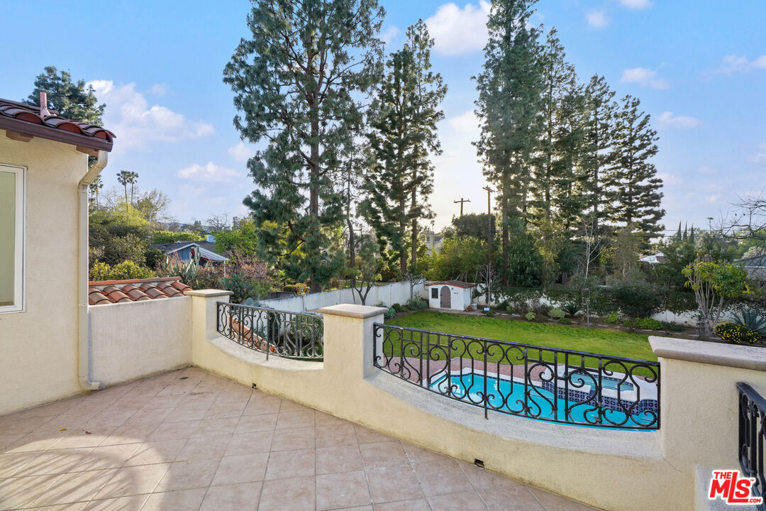 5309 Louise Avenue Encino, CA 91316 - Photo 35 of 38 a view of a park with iron fence
