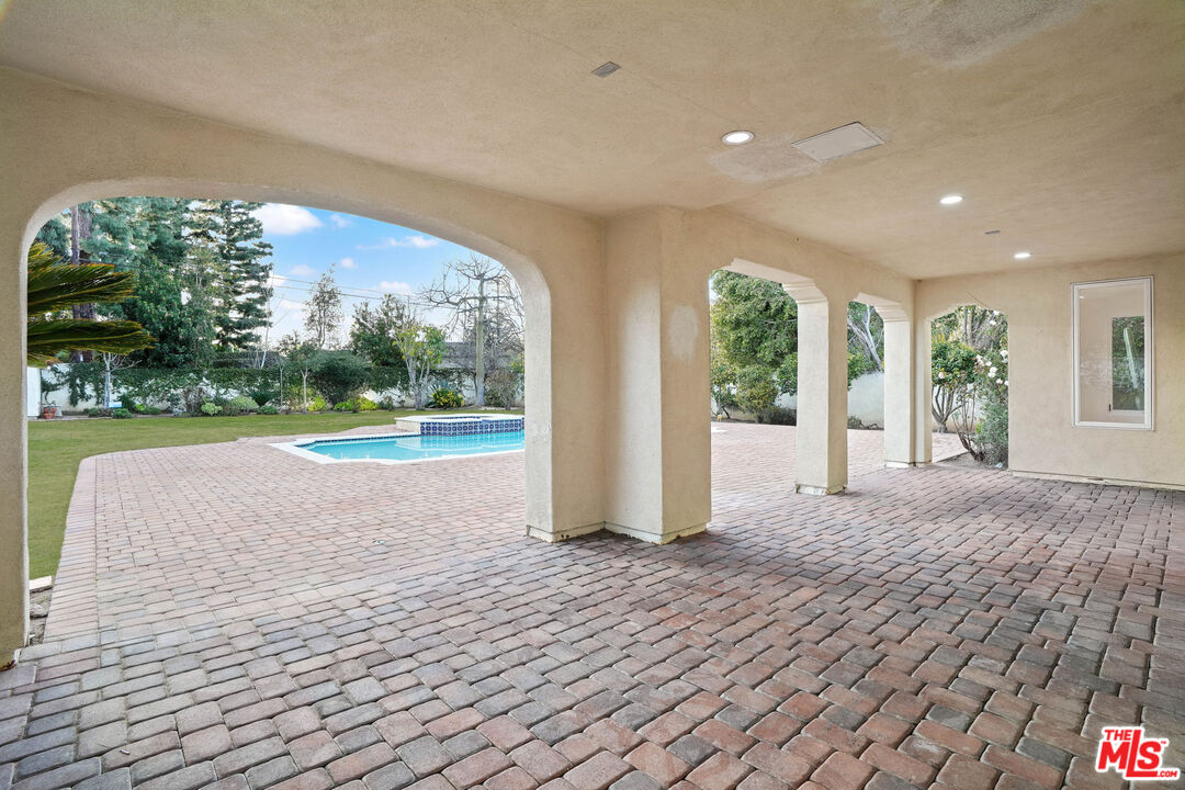 5309 Louise Avenue Encino, CA 91316 - Photo 37 of 38 a view of livingroom with yard and mountain view