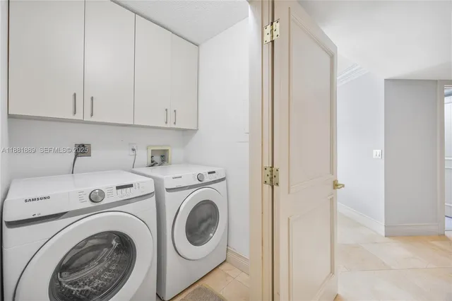 a spacious bathroom with a tub shower and a sink