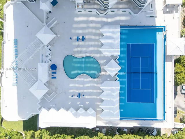 a living room with furniture and white walls