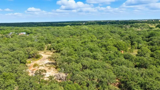 a view of a city with an ocean