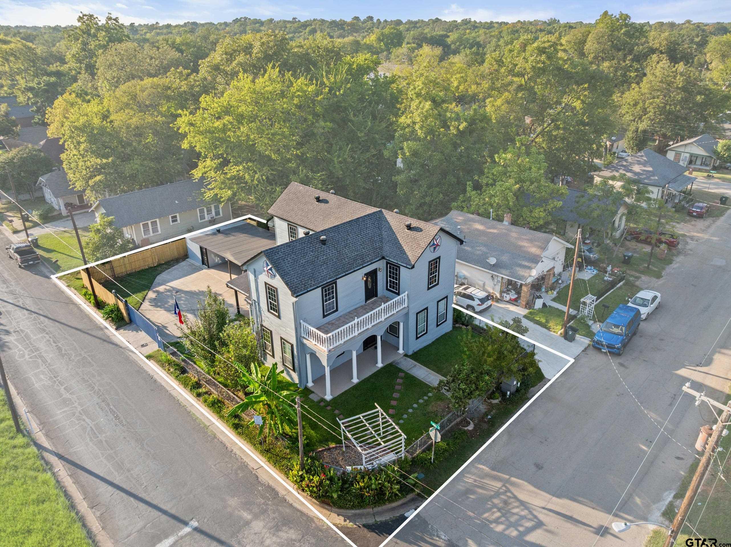 1002 North Normandy Avenue Tyler, TX 75702 - Photo 2 of 41 an aerial view of a house