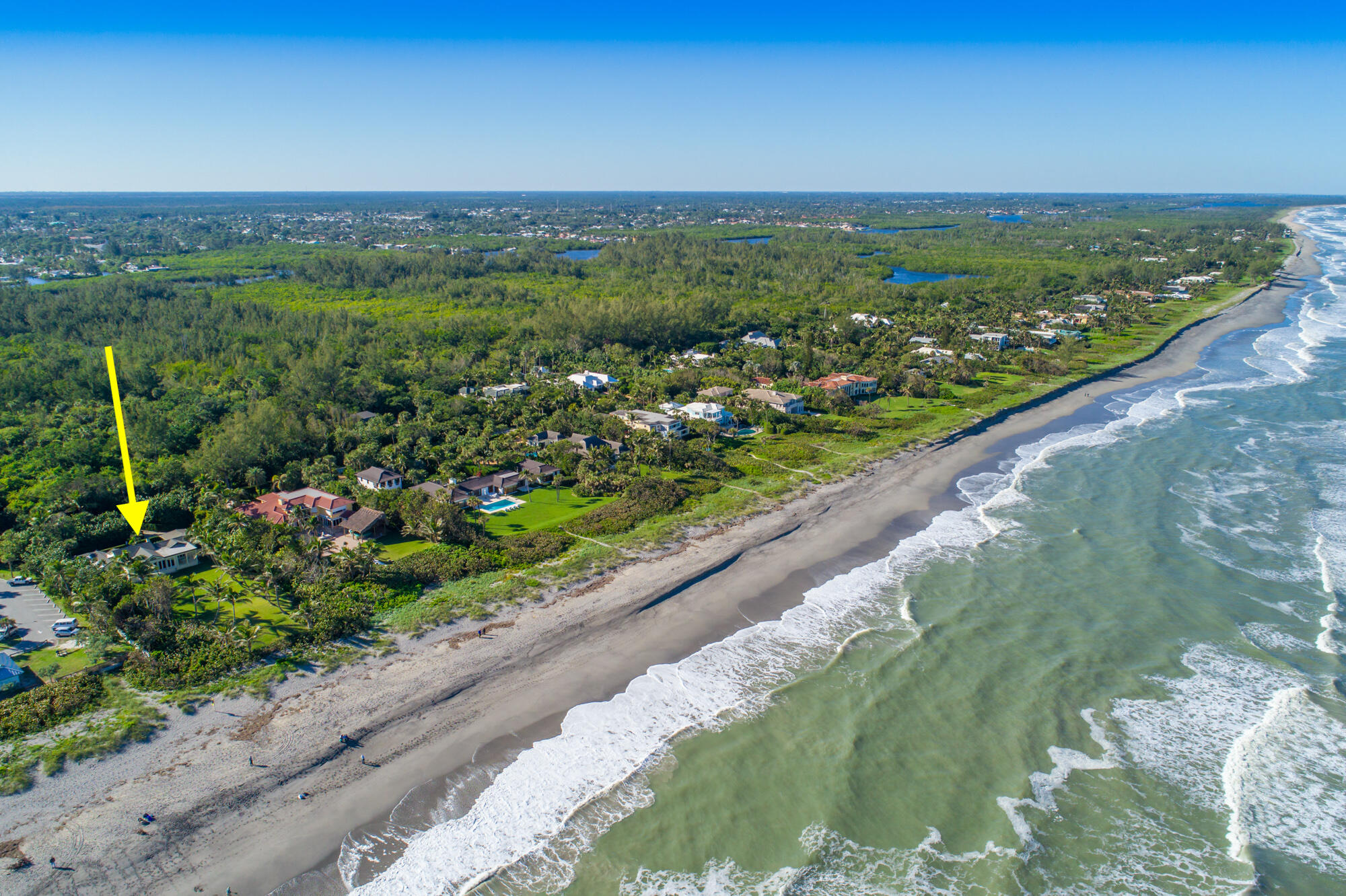 5 North Beach Road Hobe Sound, FL 33455 - Photo 2 of 26 a view of a lake with a mountain in the background