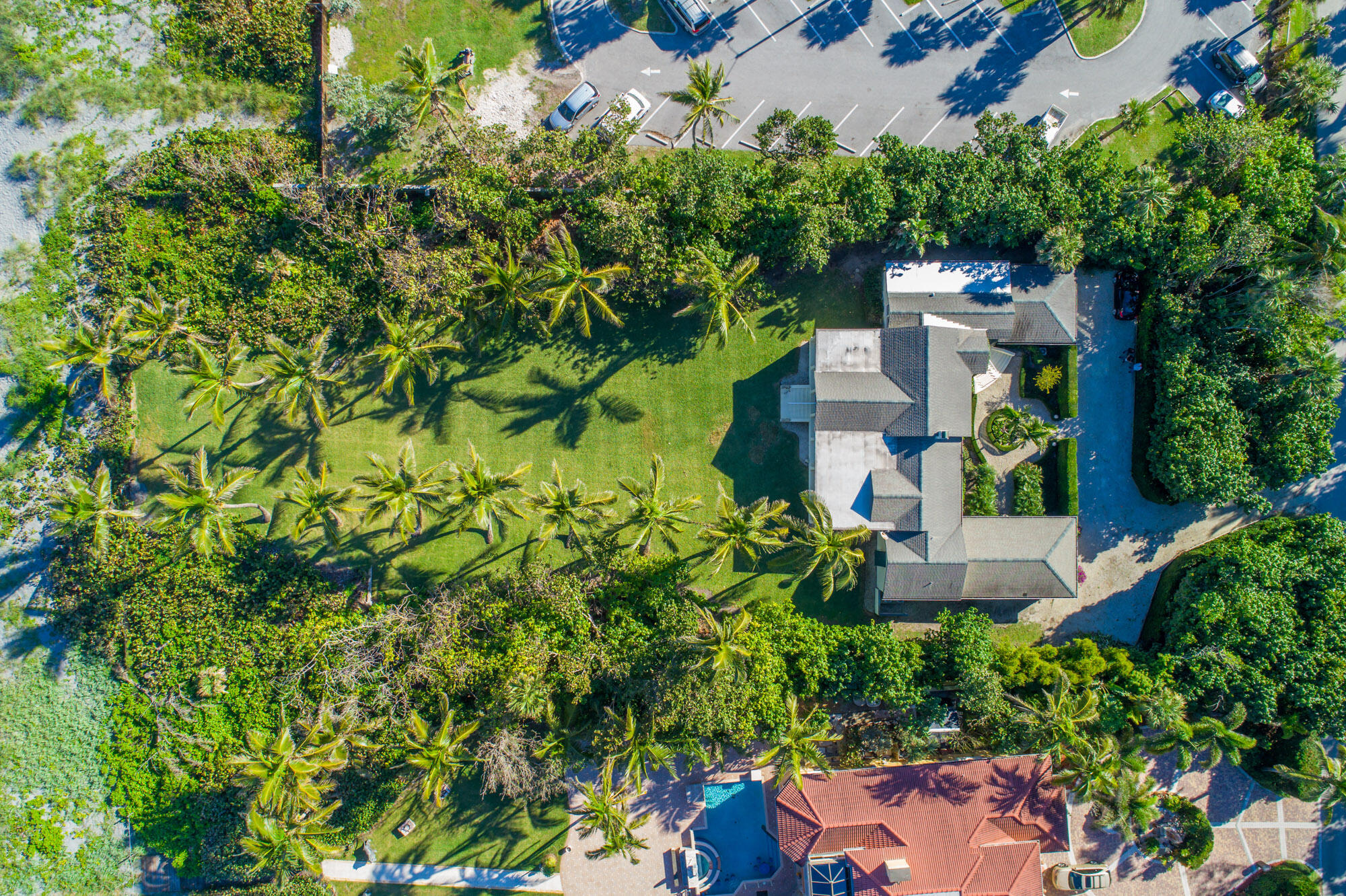 5 North Beach Road Hobe Sound, FL 33455 - Photo 4 of 26 an aerial view of a house with a yard