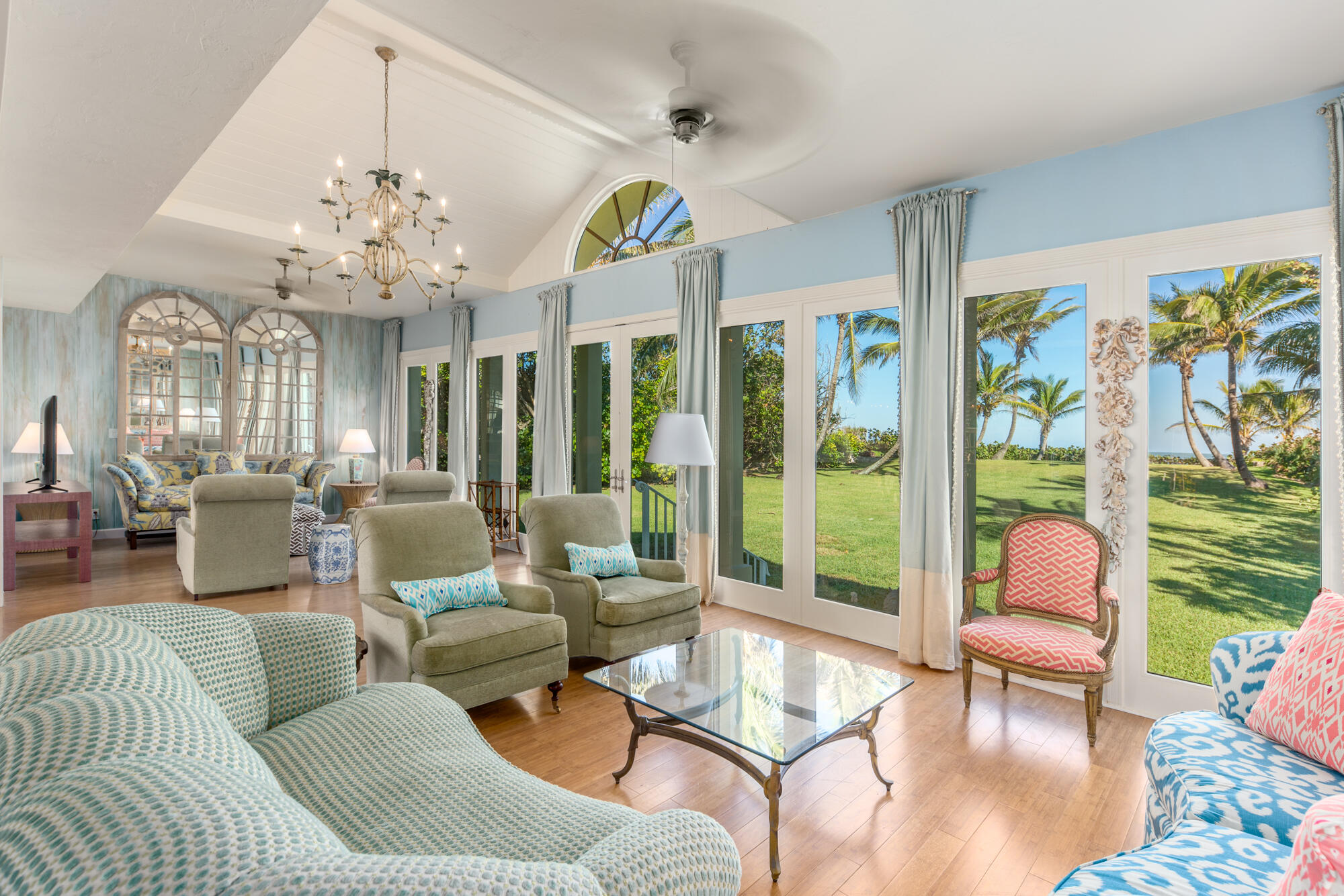 5 North Beach Road Hobe Sound, FL 33455 - Photo 10 of 26 a living room with furniture and a large window