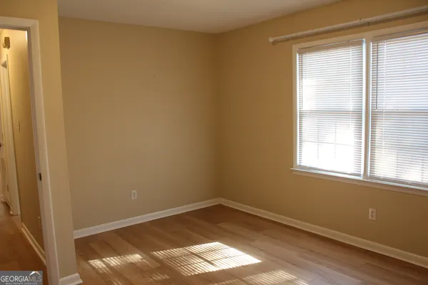 a view of an empty room and window