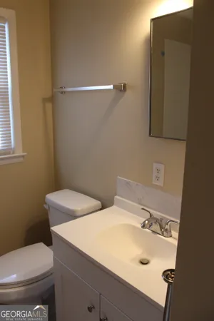 a bathroom with a sink and a toilet