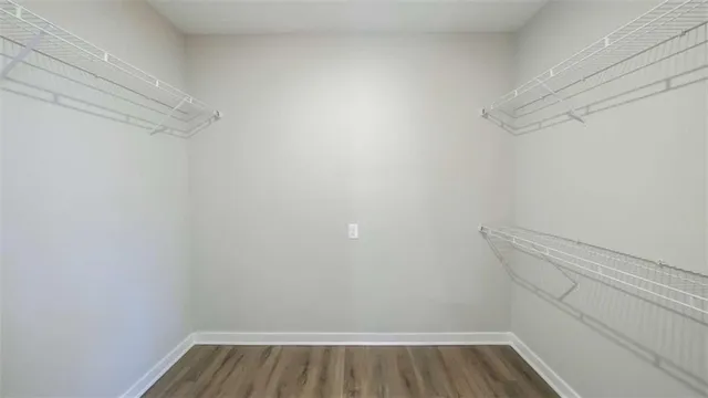 a view of an empty walk in closet