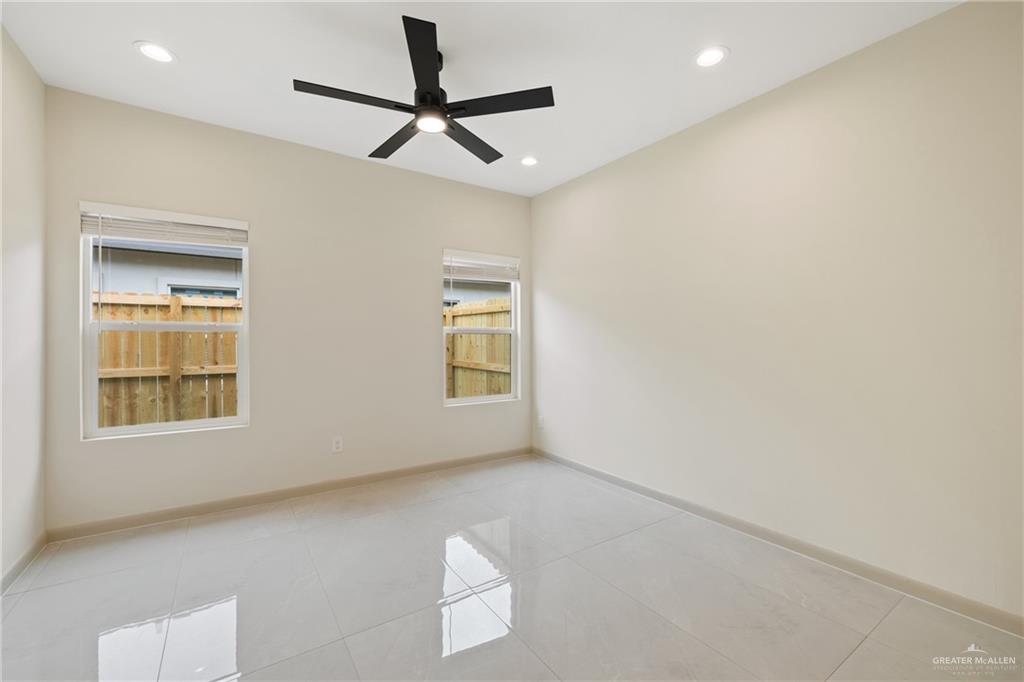 1901 West Violet Drive, Unit 4 Pharr, TX 78577 - Photo 8 of 10 a view of livingroom with hardwood floor and window