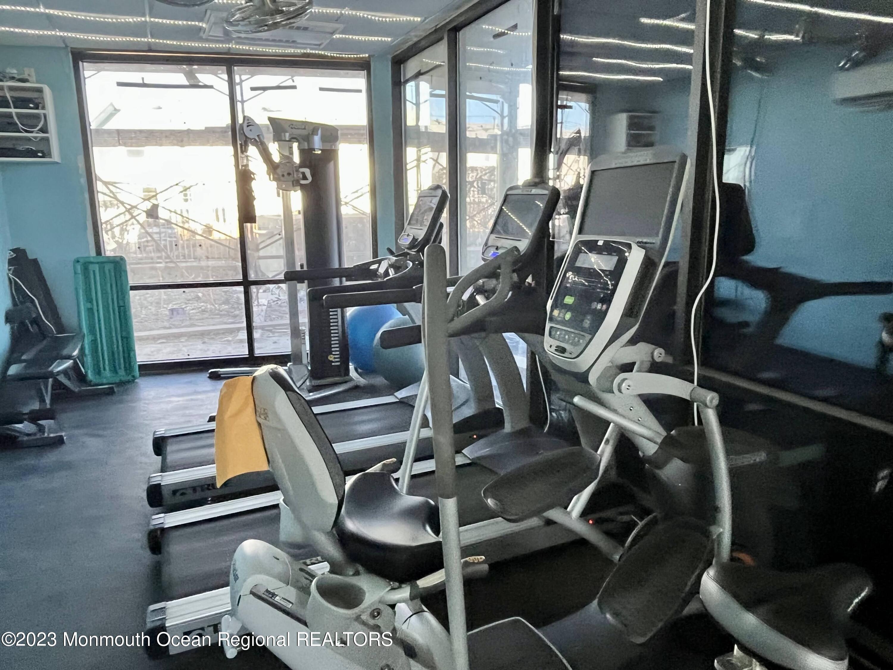 525 Ocean Boulevard, Unit 405 Long Branch, NJ 07740 - Photo 17 of 18 a view of a room with gym equipment