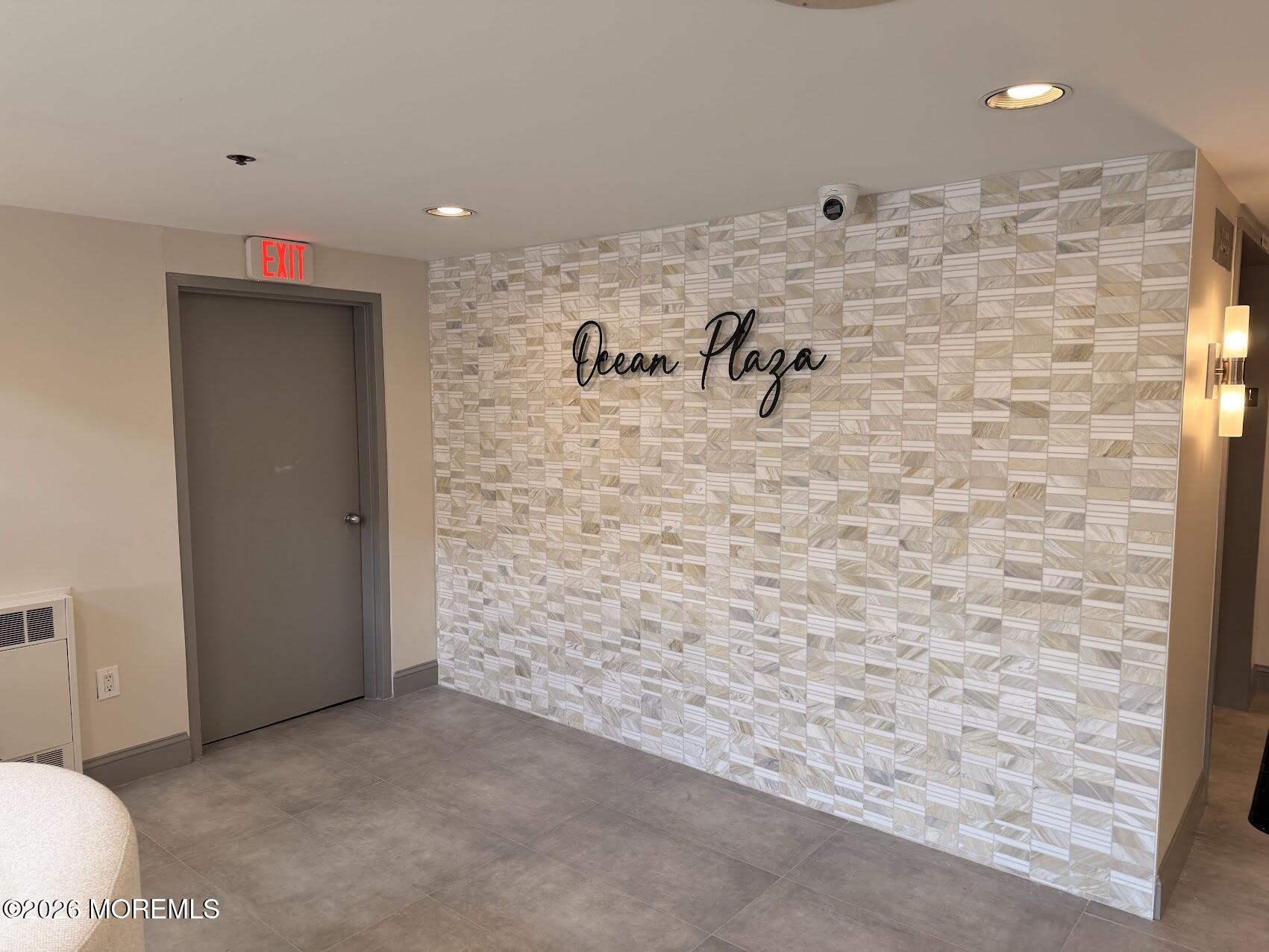 525 Ocean Boulevard, Unit 405 Long Branch, NJ 07740 - Photo 3 of 18 a bathroom with a shower