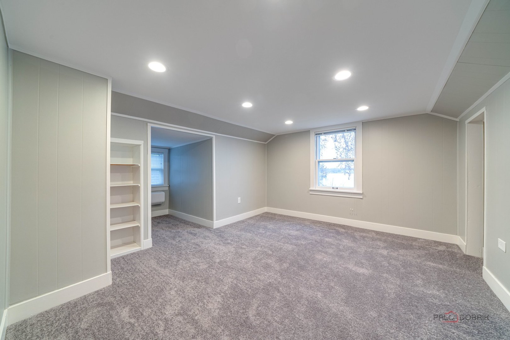 163 Eagle Point Road, Unit 2 Fox Lake, IL 60020 - Photo 24 of 38 a view of an empty room with a window