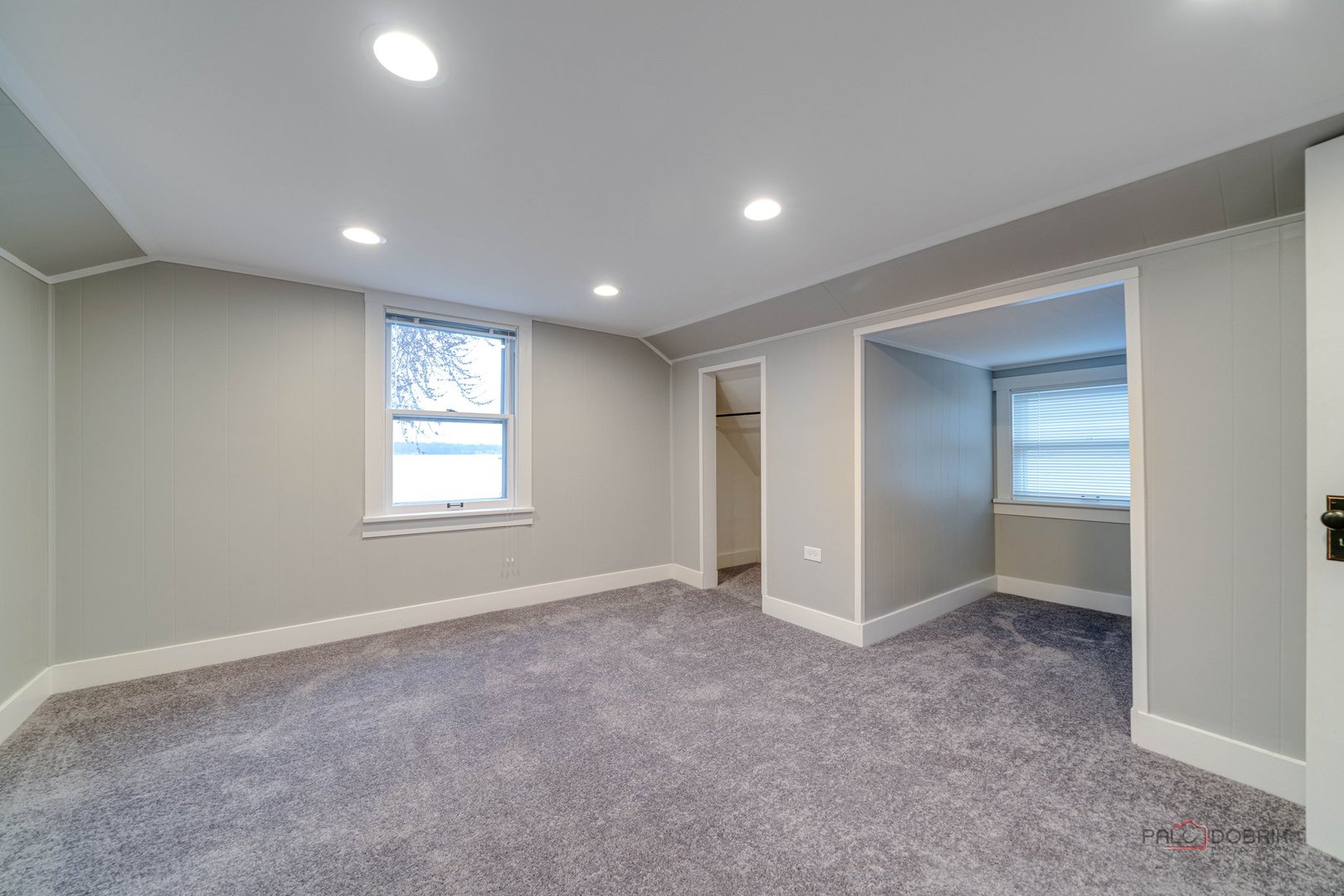 163 Eagle Point Road, Unit 2 Fox Lake, IL 60020 - Photo 25 of 38 an empty room with windows and closet