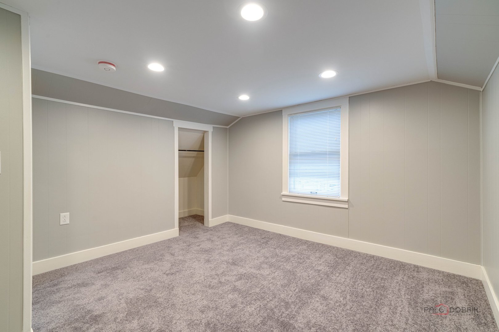 163 Eagle Point Road, Unit 2 Fox Lake, IL 60020 - Photo 32 of 38 a view of an empty room with a window