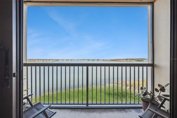 a balcony with chairs