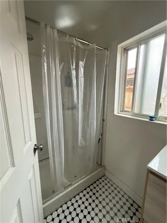 a bedroom with a bed and closet