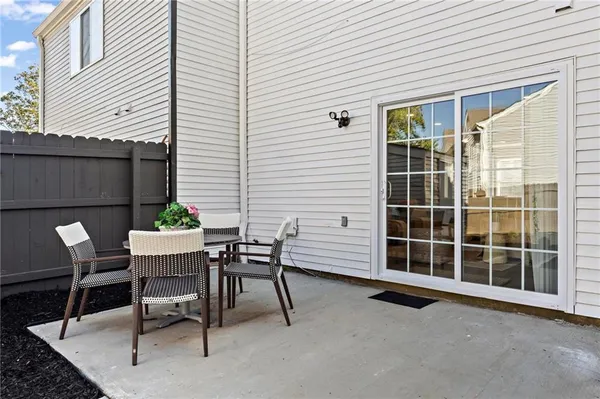 a view of a house with a table and chair